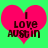 Two identical pixelated heart-shaped icons with green background, each displaying text "I LOVE AUSTIN" in dark brown letters.
