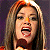 A split-frame contact sheet showing a woman singing into a microphone on the left and green text reading "Original Icons .com" on the right, both in pixelated style.