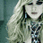 Three distinct celebrity portraits in a with pixelated rendering and varying color palettes