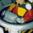 Pixelated 3D-rendered character with teal body, red and yellow accents, white star-like shapes on chest, dark blue outline, and light gray background.