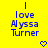 Yellow background with blue pixelated text reading "I love Alyssa Turner" and a small heart symbol below the text.