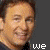A pixelated collage of a man's face with text overlays and two group photos, transitioning from individual portraits to family scenes.