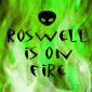 Green background with black text 'ROS WELL IS ON FIRE' and a UFO symbol above the text.