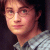 Pixelated image of a person with dark hair and glasses wearing a light gray striped shirt, with the word 'harry' in white text at bottom right.