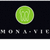 a pixelated animation showing green circular icons with stylized faces, text elements shifting between 'mona-vie' and 'experience the difference', and mirrored background text