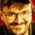 A pixelated 50x50 AIM buddy icon featuring a split composition with a person's face on the left and bold yellow text on a red background reading "Dude, Where's My Country" on the right.
