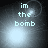 Pixelated text 'im the bomb' in light blue on dark background with shifting bright circular glow effects.