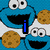 Blue Cookie Monster face with brown cookies and a blue 'i' on a white background, next to a chocolate chip cookie with green 'love' text on pink stripes.