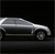 Pixelated silver sedan in side profile against black background, visible front wheel and door panel details, no text or additional elements.