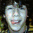 Six distinct pixelated portraits of a person with dark curly hair in various poses, expressions, and clothing across two