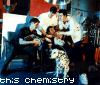 Animated sequence showing a group of people seated together with text changing below them from 'this chemistry' to 'is a bad recipe'.