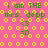Pixelated pink background with yellow circular patterns and green text reading 'i am THE mrs. depp <3 =D' in multiple repeated sections.
