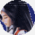 Circular icon shows a character with long dark hair in profile, wearing white and red clothing against blue background.