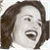A static split-screen image with a grayscale portrait on the left and green text on a dark background on the right.