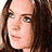 A pixelated contact sheet of two frames showing a woman's face on the left and text reading "I KNOW WHO KILLED ME" on the right against a black background.
