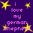 Purple background with yellow stars and pink text reading "i love my german shepherd" repeated in a pattern