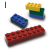 Four display Lego bricks with text labels; the leftmost shows 'I' while others show 'Play', 'With', and 'Legos' in brown serif font