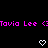 Pixelated text in bright pink reads "Tavia Lee" followed by a repeated name and partial character, with two white pixel hearts below on black background.