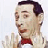 A 2x2 contact sheet of a pixelated animated icon featuring two frames showing a man in formal attire with red bow tie and gray suit, accompanied by text reading "Pee-Wee is my homeboy" below the left frame.