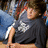 A pixelated image shows a person in dark clothing with light hair against a blue background, next to bold black text on red reading 'HOTTIE!!!'