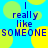 Blue background with yellow-green circles; text reads "I really like SOMEONE" in blue pixelated font, repeated twice horizontally.