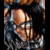 Pixelated character with dark hair and glasses, wearing blue jacket over red shirt, holding silver object against black background.