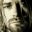 A 4-frame contact sheet of a pixelated black-and-white animation featuring the face of Kurt Cobain with subtle lighting changes across frames.
