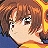 Pixelated close-up of a character with brown hair and light skin, wearing a yellow top against a blue background.