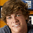 Pixelated image of a person with brown hair and a gray shirt, next to pixelated text reading "Isnt He Dreamy" on a white background.