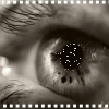 Black-and-white close-up of a human eye with filmstrip borders, showing subtle animation changes in the pupil's white dot pattern across frames.