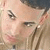 A 50x50 pixel animated buddy icon split into two frames showing a person's face on the left and Puerto Rican flag elements on the right.