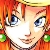 Pixelated close-up of a character with bright red hair, blue eyes, and a smiling expression, wearing green earrings and a dark necklace.