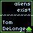 Four identical pixel-art display 'aliens exist' text above a dotted line, with 'Tom DeLonge' and green alien icons below; two show light blue text while the other two have white text