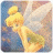 Pixelated image of a blonde character with large wings, wearing blue and green clothing against a gradient background.