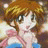 A 48x48 pixel buddy icon featuring a cartoon anime-style character with brown hair and blue eyes on the left, paired with text reading "Anime IM" and "COM" on a black background to the right.