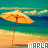 A beach scene with a yellow umbrella on orange sand, turquoise water, and white clouds in the sky. The text 'MARIA' appears below the umbrella.