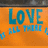 Static pixel art icon with orange background and blue text reading "LOVE ALL THERE" in blocky, rounded letters.