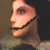 A pixelated figure with dark hair and a green collar appears in four positions, showing slight variations in head angle across frames