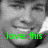 A grayscale image of a smiling person with green text overlay reading 'love this face can't get enough' in two segments.