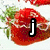 Six pixelated strawberry-themed images arranged in a , each with a single lowercase letter overlaid in bold white font with black outline