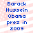 Blue pixelated text on a pink and white striped background with white dots, reading 'Barack Hussein Obama prez in 2009' in two identical vertical