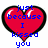 Red heart-shaped icon with blue pixelated text reading "just because I kissed you" on top left, "doesn't mean I missed u people change" on top right, and "and thank god I DID!" at bottom.