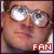 Pixelated close-up of a person's face with glasses and a red 'FAN' text overlay in the bottom-right corner.