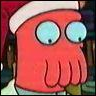 Red cartoon character with large blue eyes and a Santa hat, hand near mouth, against blurred background.