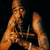 Pixelated image of a person in orange tones with raised hand and 'R.I.P.' text on black background