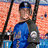 Pixelated image of a person in blue clothing holding a dark object with circular emblem, orange background, and text reading 'david wright' on black