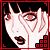Animated pink-toned face with black hair, red border, and red square pixel clusters in bottom-right corner