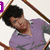 Six distinct pixelated portraits of a young man with dark curly hair, each with unique clothing, expressions, and text overlays on purple backgrounds.