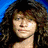A pixelated image of a person with long curly hair in three distinct views showing different angles and backgrounds.