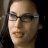 A contact sheet of two animated frames showing a person with glasses and the text "jersey girl" in blue pixelated font on white background.